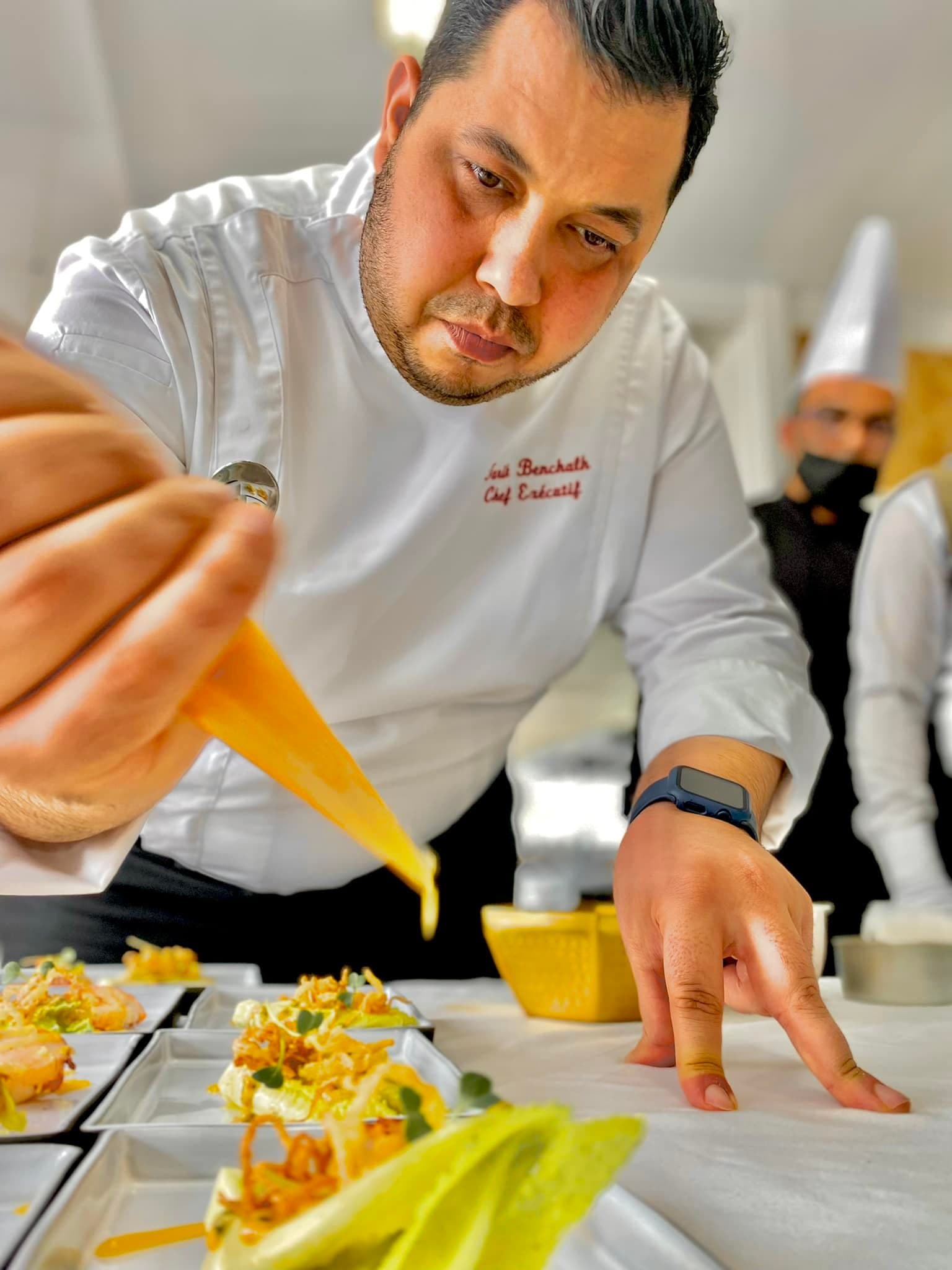 Chef Tarik working in a professional kitchen